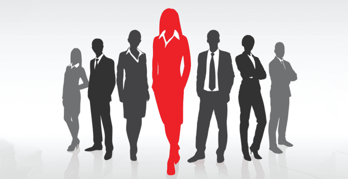 Greyed Out Silhouettes of Businesspeople in Shallow V Line with Woman in Front Highlighted in Red
